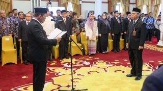 Ansar Ahmad Mengukuhkan Hisyam Wahyudi sebagai Kepala Perwakilan BPKP Provinsi Kepri