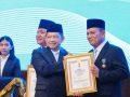 Ansar Ahmad Menerima Satyalancana Wira Karya dari Presiden RI